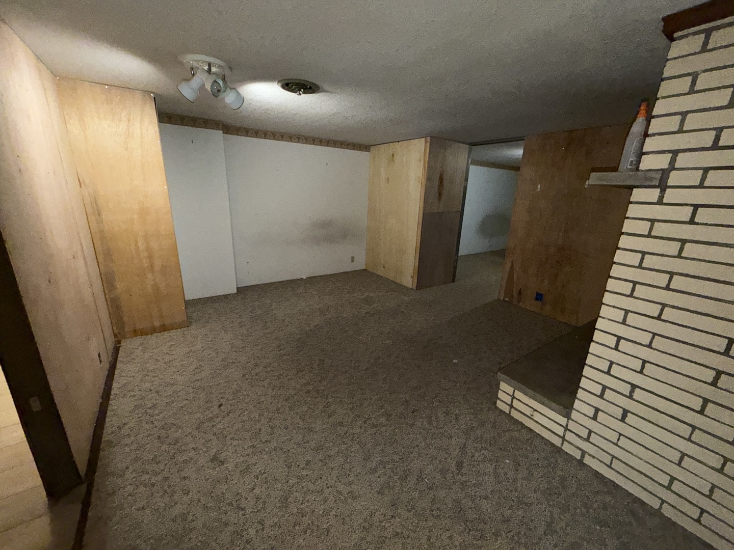 4019 5th Street East Moline, IL 61244 - Photo 24 of 37 a view of a livingroom with wooden floor and stairs