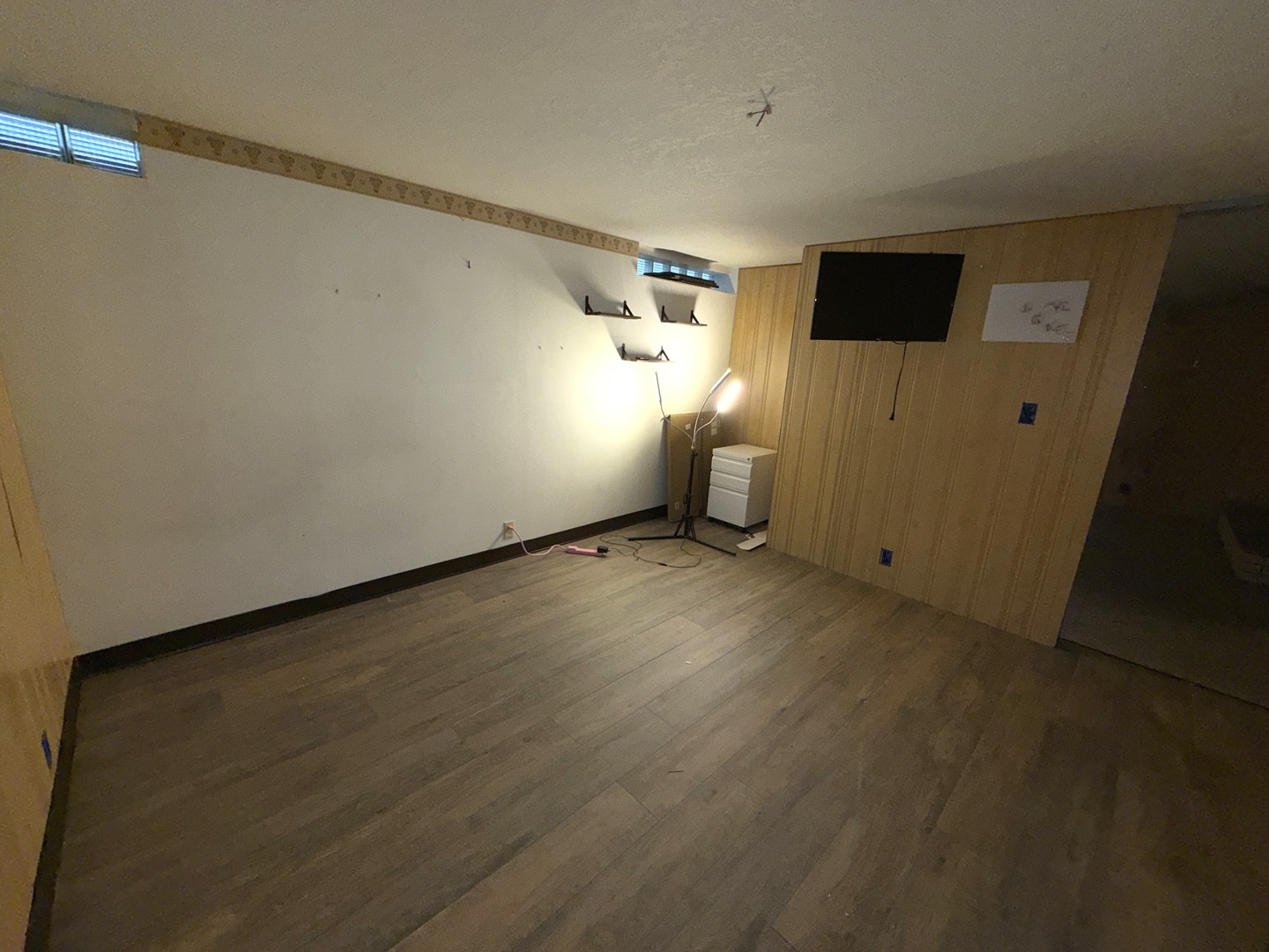 4019 5th Street East Moline, IL 61244 - Photo 27 of 37 a view of empty room with wooden floor