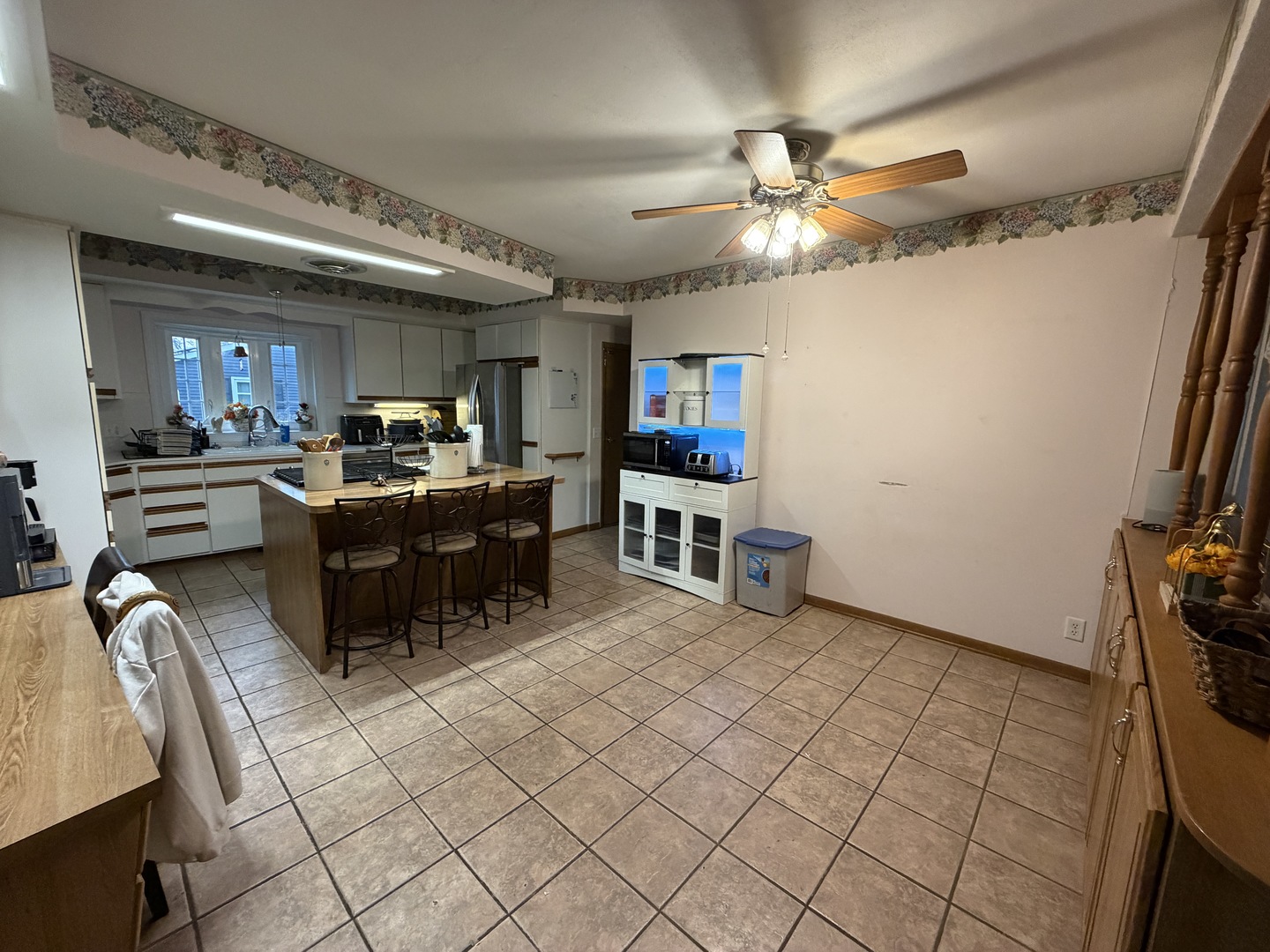 4019 5th Street East Moline, IL 61244 - Photo 3 of 37 a kitchen with lots of counter top space and appliances