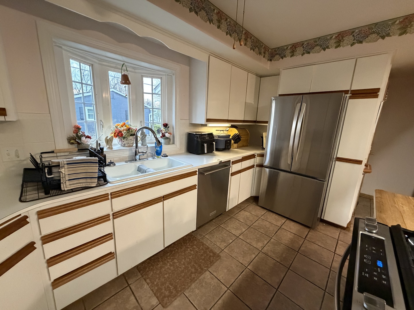 4019 5th Street East Moline, IL 61244 - Photo 7 of 37 a kitchen with stainless steel appliances a refrigerator sink and microwave