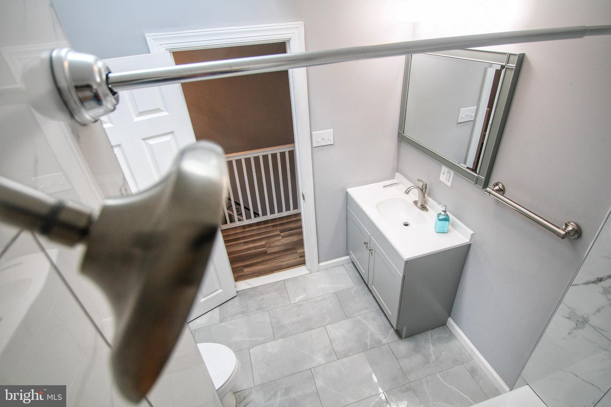 268 Sanford Road Upper Darby, PA 19082 - Photo 20 of 25 a utility room with multiple dryer and washer