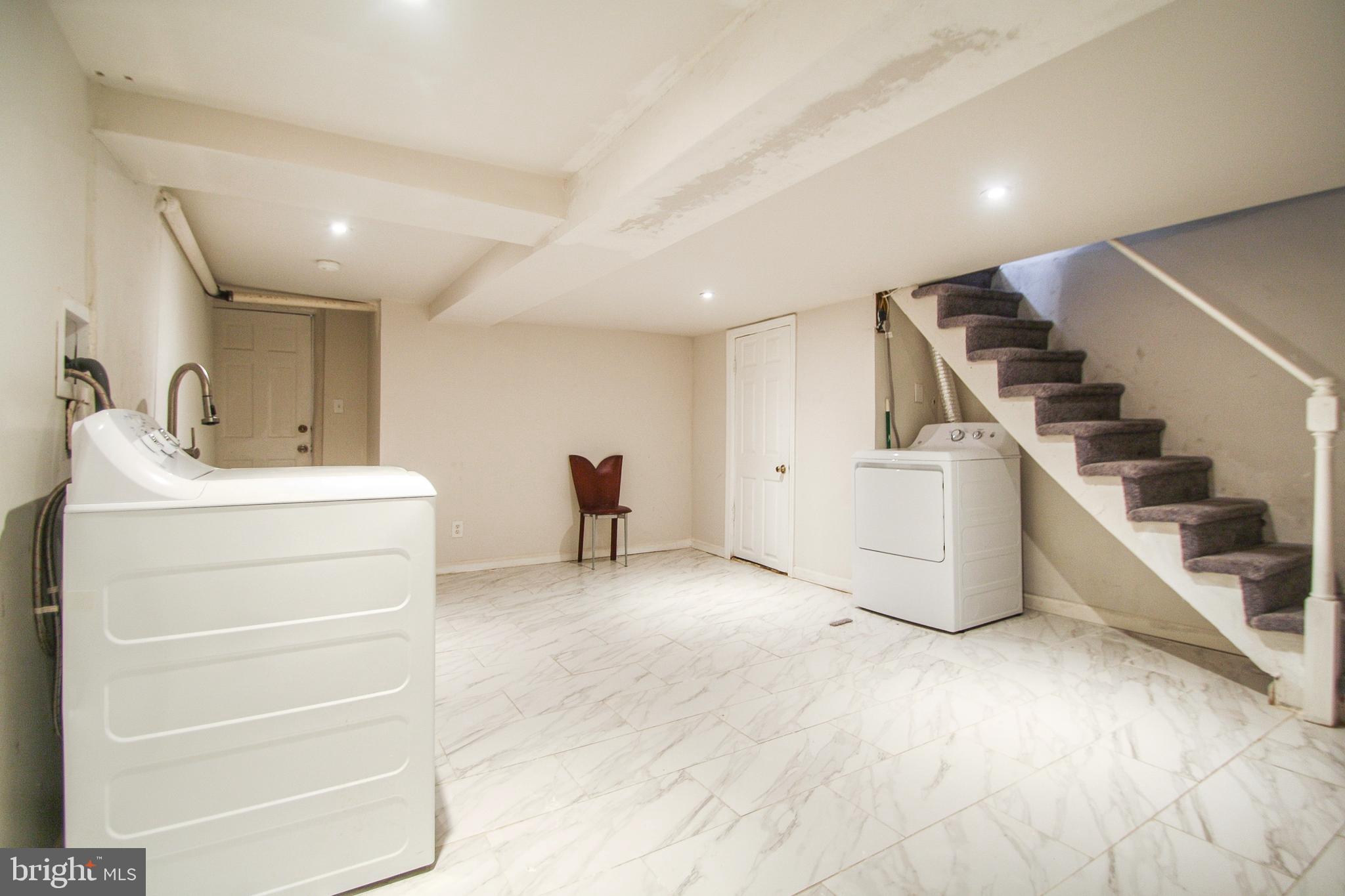 268 Sanford Road Upper Darby, PA 19082 - Photo 21 of 25 a bathroom with a sink and a mirror