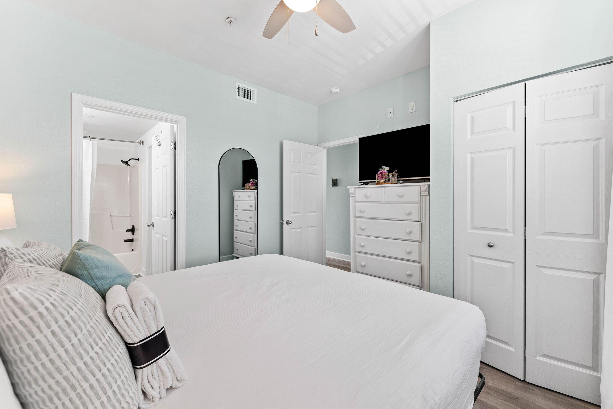 145 Spires Lane, Unit 205 Santa Rosa Beach, FL 32459 - Photo 11 of 40 a bedroom with a bed and a flat screen tv