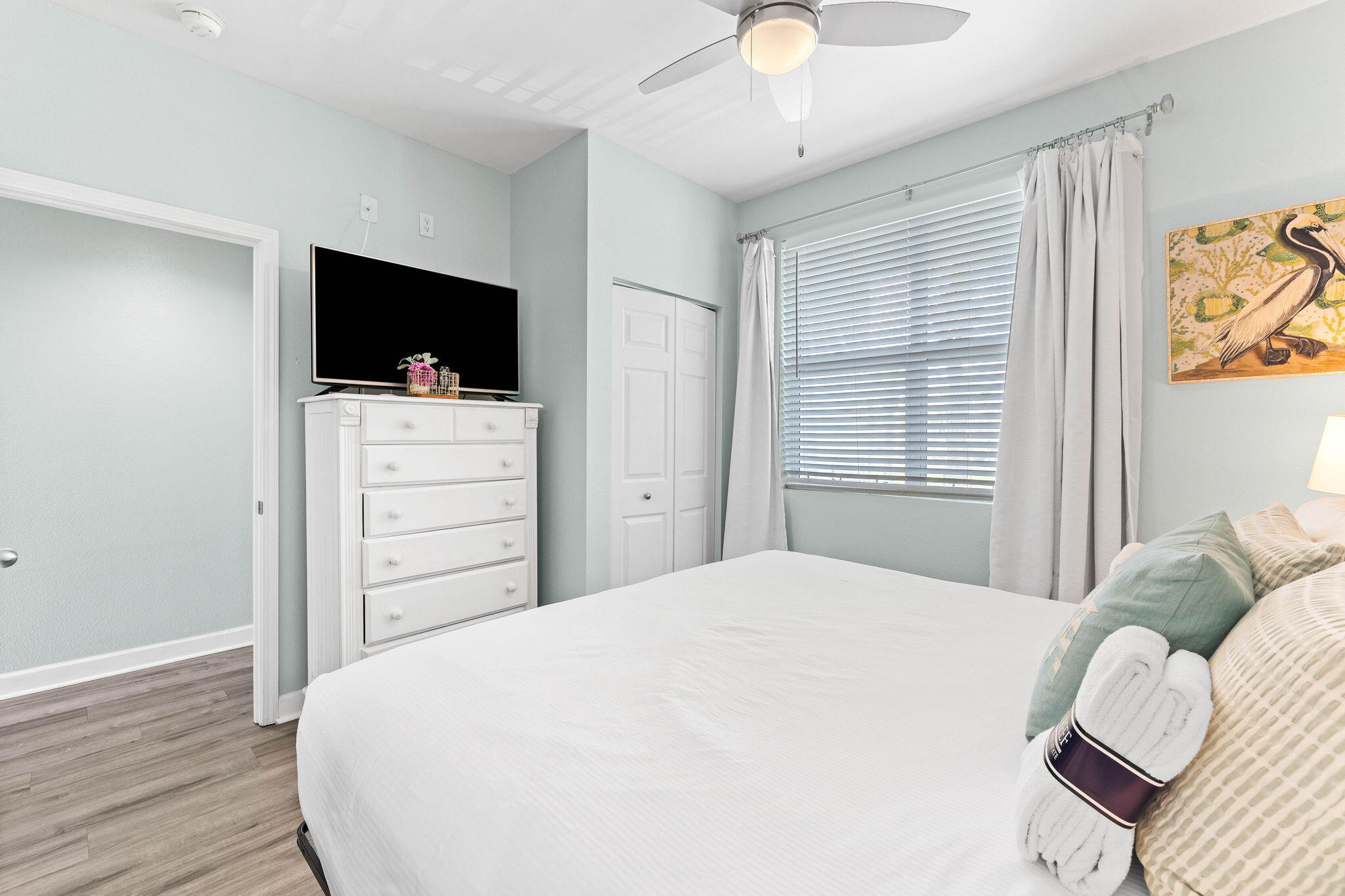 145 Spires Lane, Unit 205 Santa Rosa Beach, FL 32459 - Photo 12 of 40 a bedroom with a bed and a flat screen tv