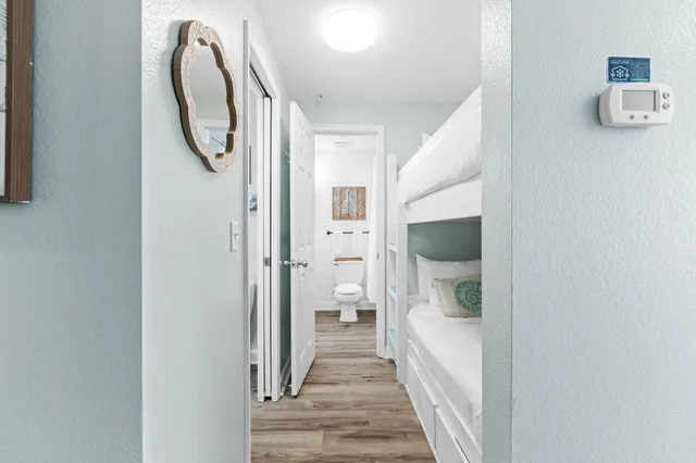 a view of a hallway with windows