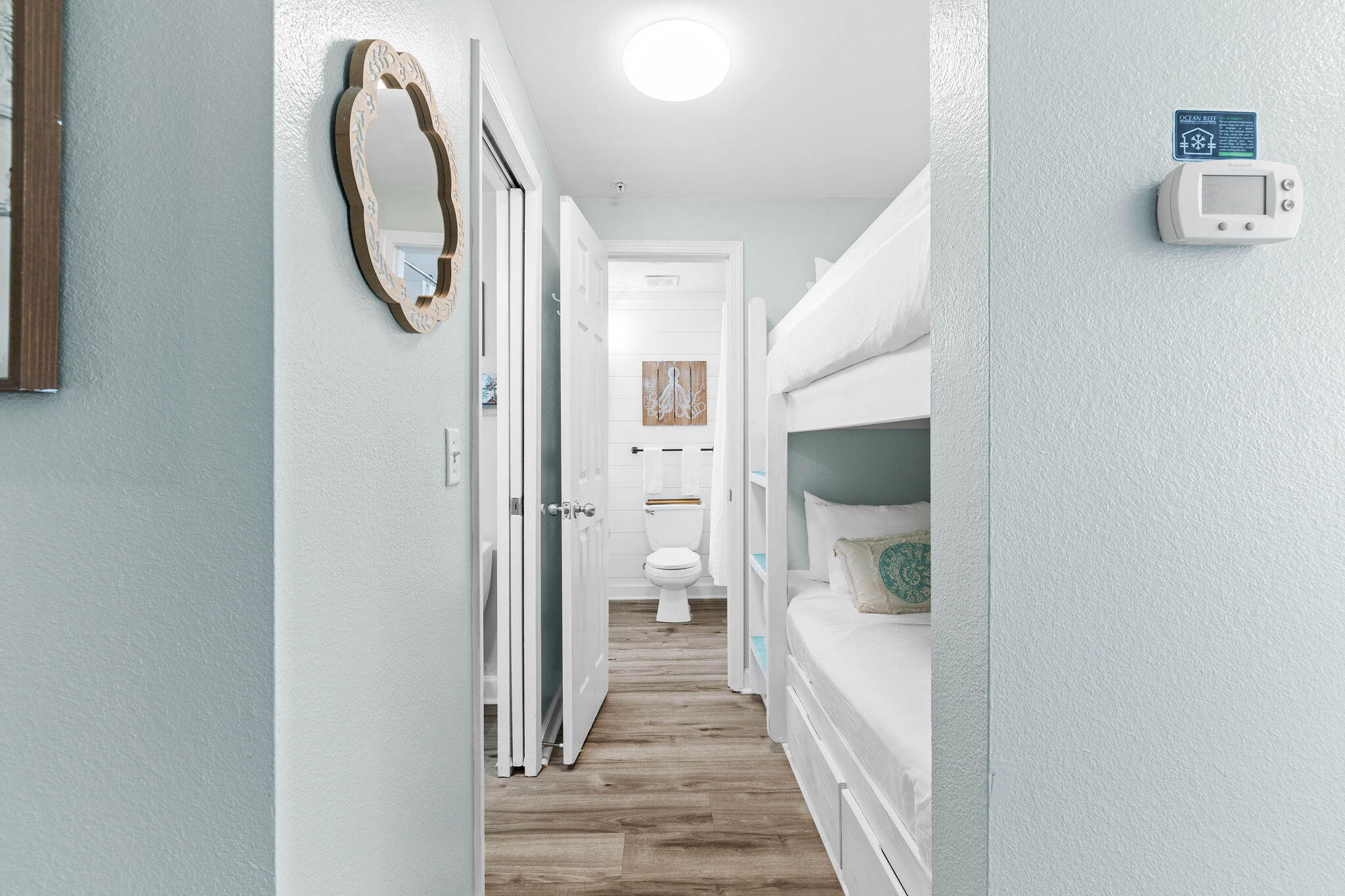 145 Spires Lane, Unit 205 Santa Rosa Beach, FL 32459 - Photo 17 of 40 a view of a hallway with windows