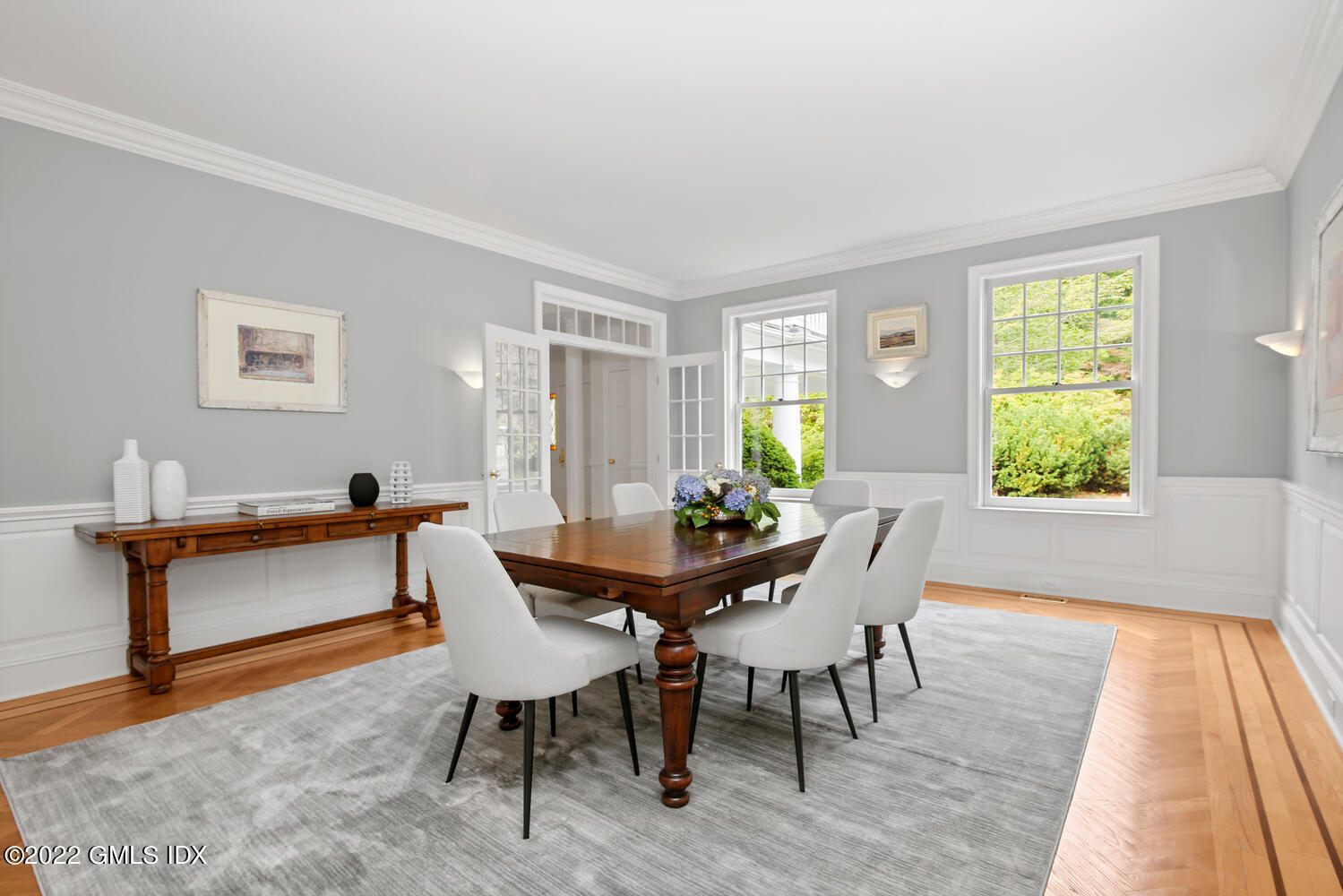 57 Partridge Hollow Road Greenwich, CT 06831 - Photo 15 of 102 a dining room with furniture and wooden floor