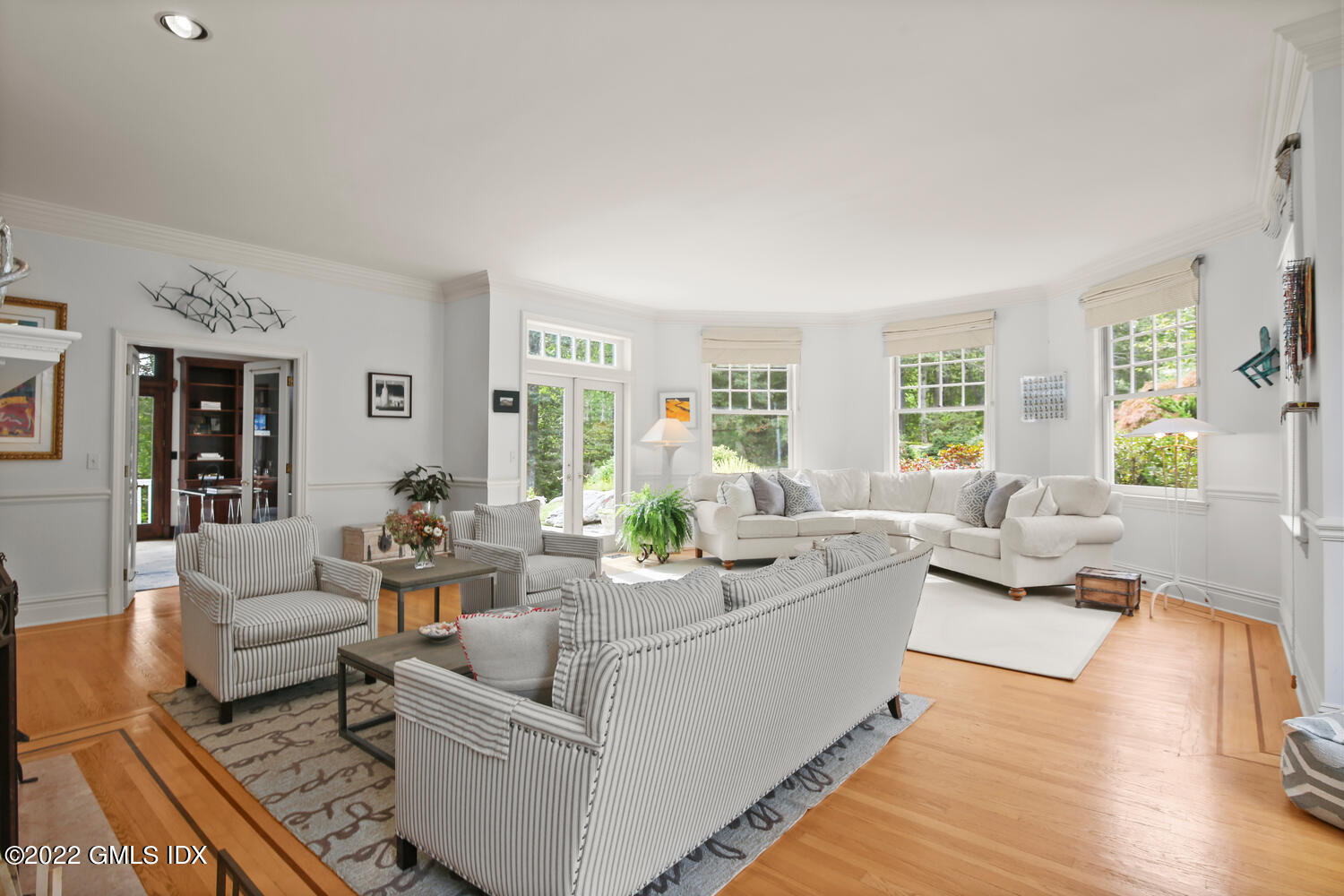 57 Partridge Hollow Road Greenwich, CT 06831 - Photo 20 of 102 a living room with furniture and a large window