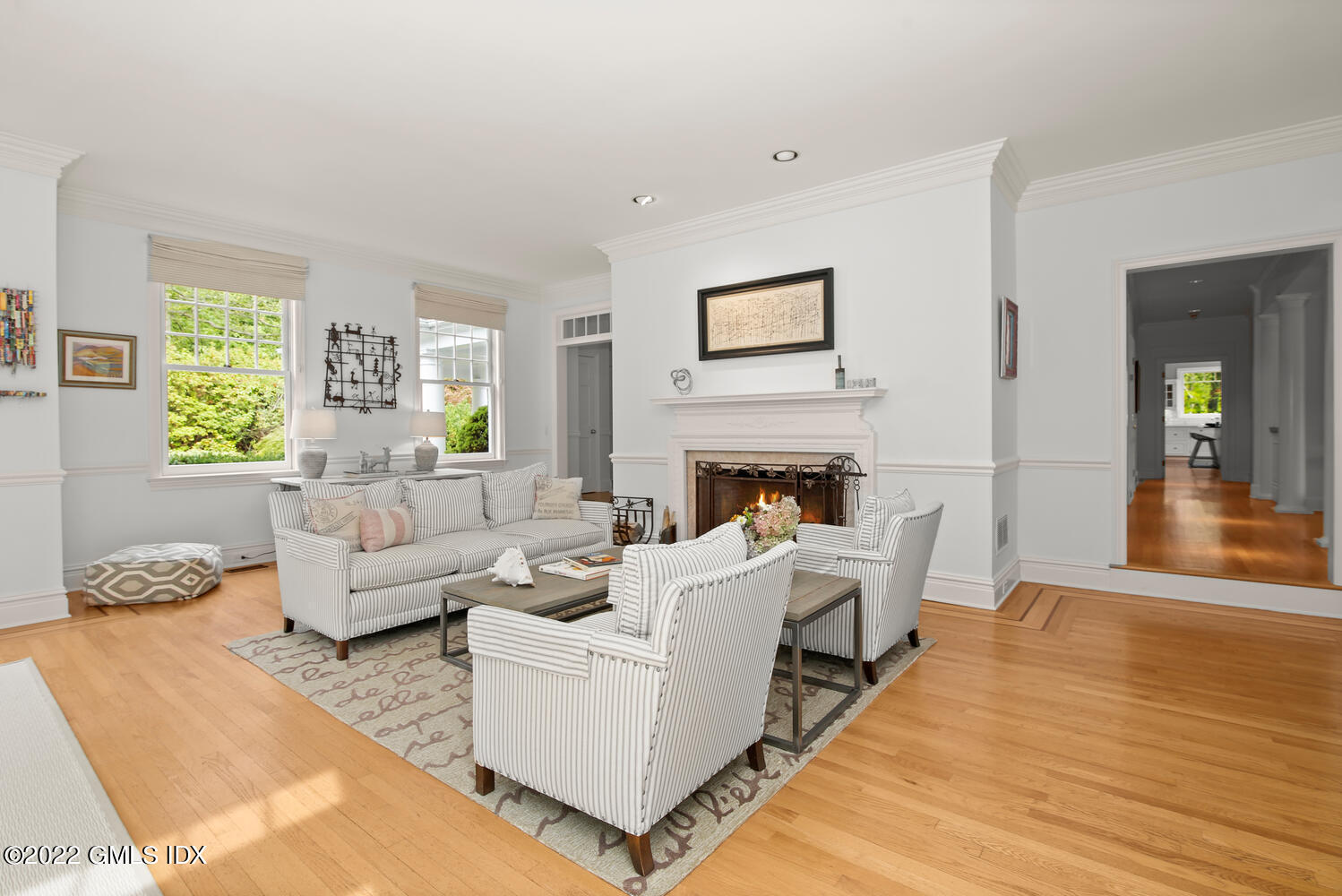 57 Partridge Hollow Road Greenwich, CT 06831 - Photo 22 of 102 a living room with furniture and a fireplace
