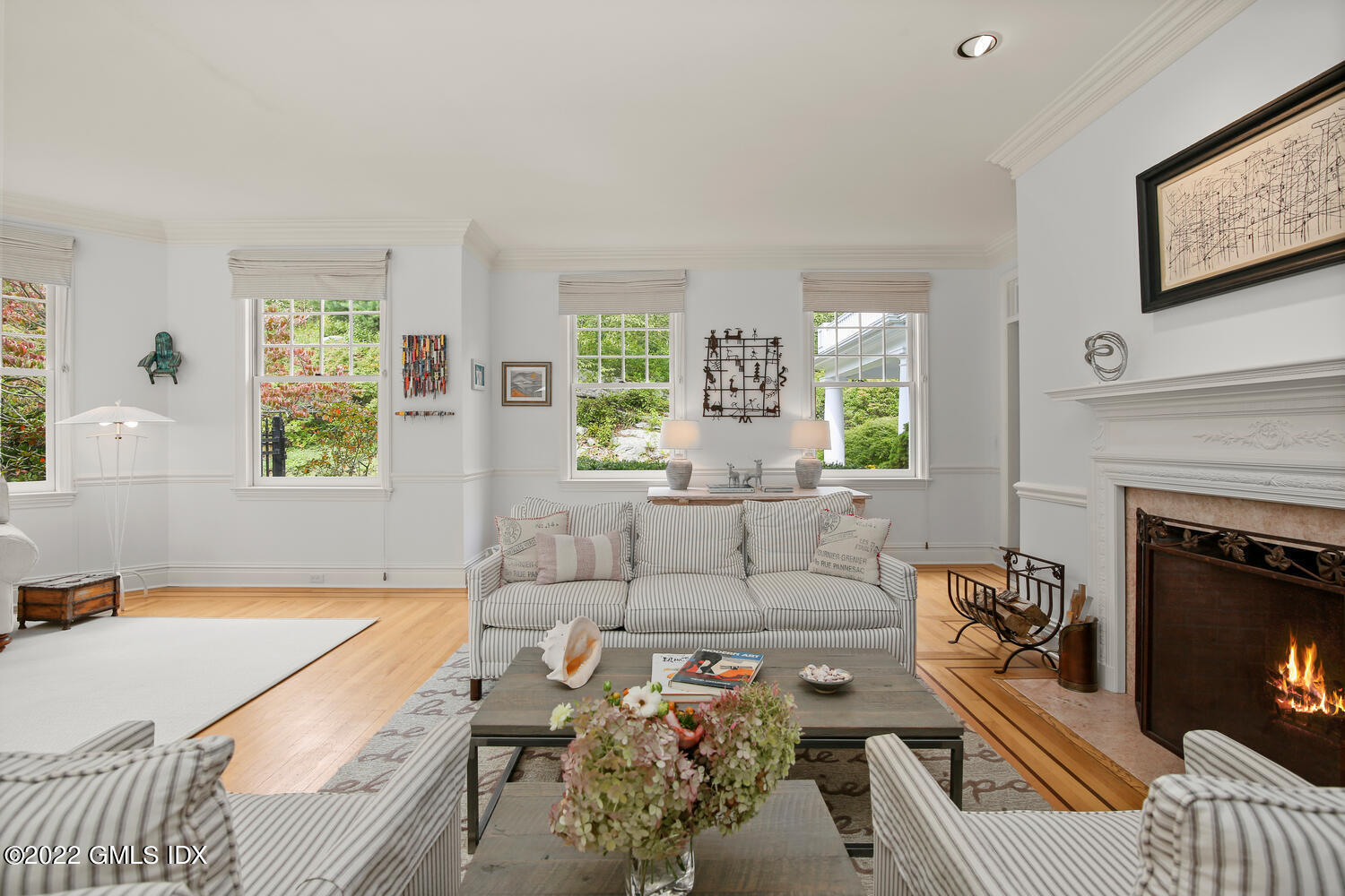 57 Partridge Hollow Road Greenwich, CT 06831 - Photo 23 of 102 a living room with furniture and a fireplace