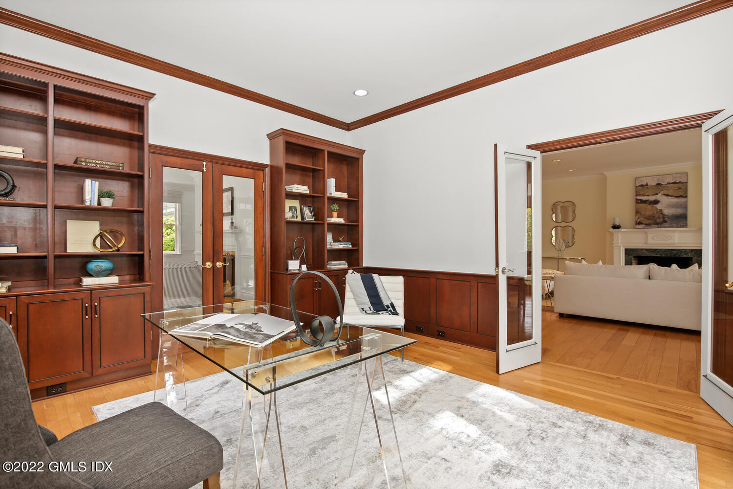 57 Partridge Hollow Road Greenwich, CT 06831 - Photo 26 of 102 a living room with furniture a rug and a window