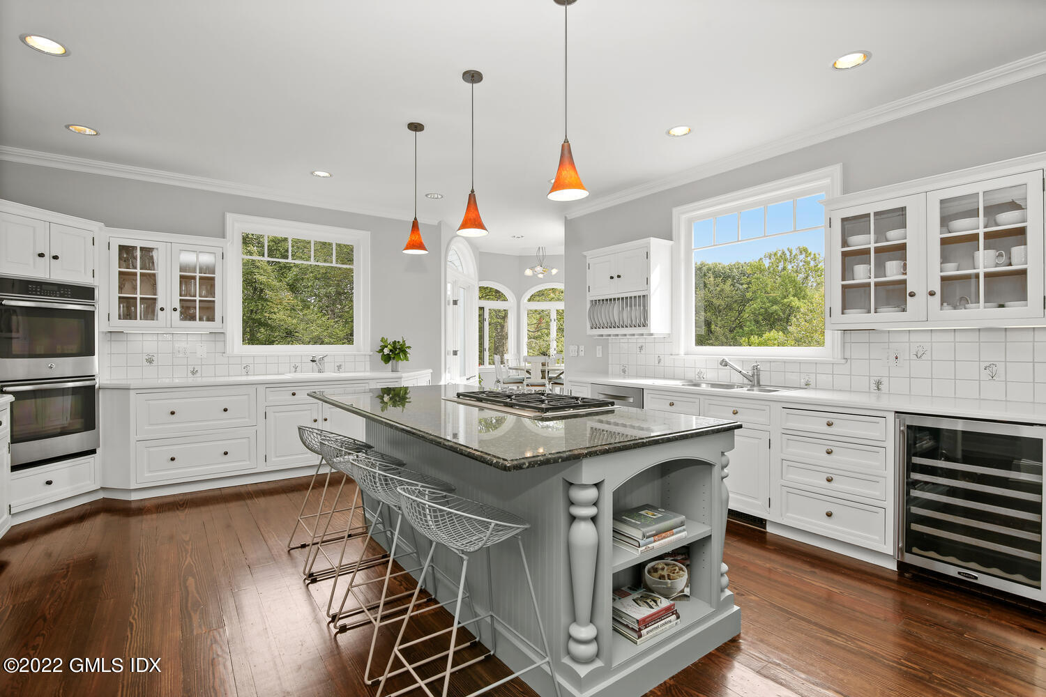 57 Partridge Hollow Road Greenwich, CT 06831 - Photo 28 of 102 a kitchen with stainless steel appliances granite countertop a stove a sink and a wooden floors