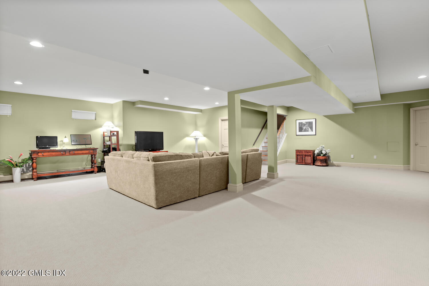 57 Partridge Hollow Road Greenwich, CT 06831 - Photo 54 of 102 a living room with furniture and a couch