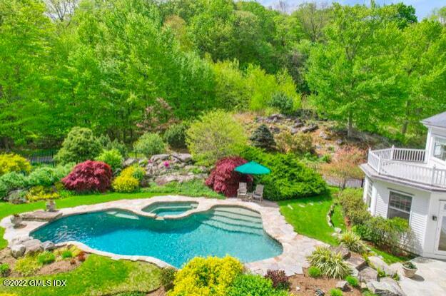 57 Partridge Hollow Road Greenwich, CT 06831 - Photo 65 of 102 a view of a table and chairs in patio