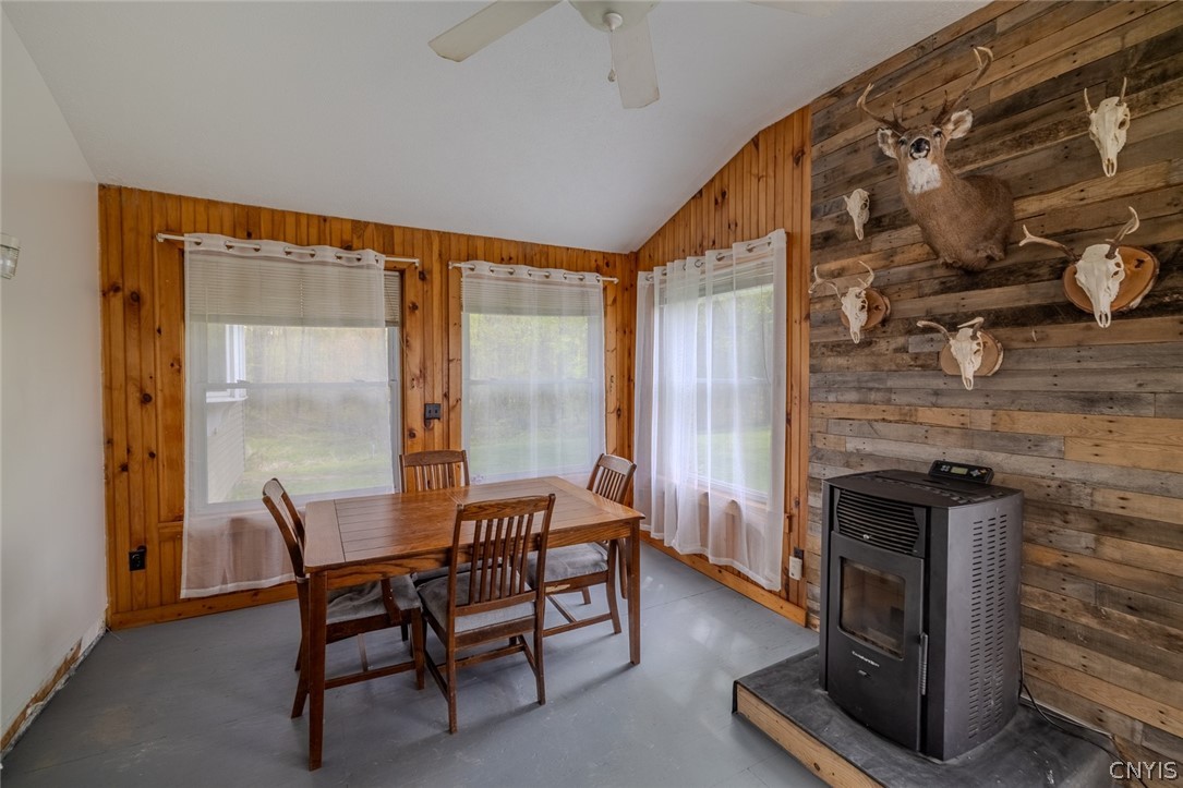 1557 Co Rte 7 Hannibal, NY 13126 - Photo 14 of 47 Den/dining room combo with pellet stove for additi