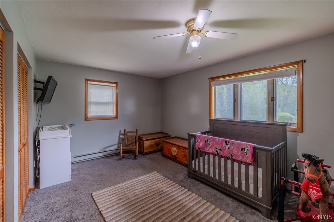 1557 Co Rte 7 Hannibal, NY 13126 - Photo 21 of 47 Second bedroom with half bathroom attached.