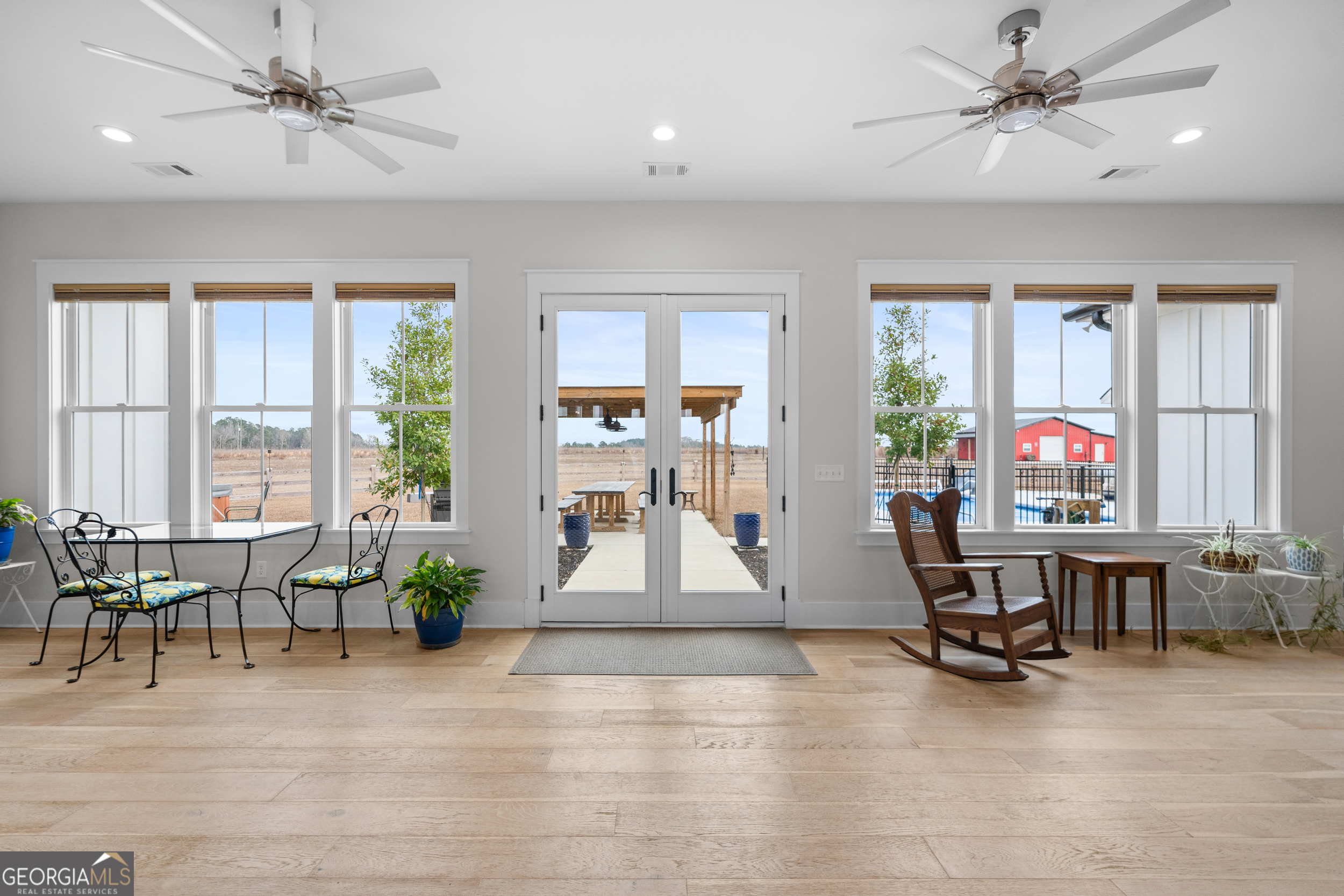 430 Jack Kennedy Road Statesboro, GA 30458 - Photo 13 of 44 a view of a livingroom with furniture and windows