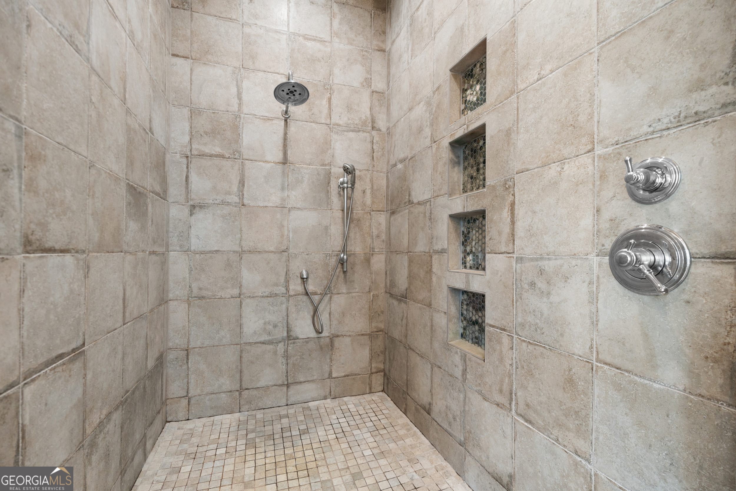 430 Jack Kennedy Road Statesboro, GA 30458 - Photo 17 of 44 a bathroom with a shower