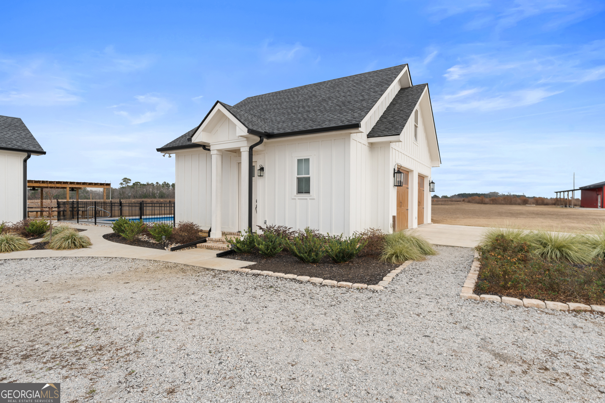 430 Jack Kennedy Road Statesboro, GA 30458 - Photo 28 of 44 a view of a house with backyard and trees