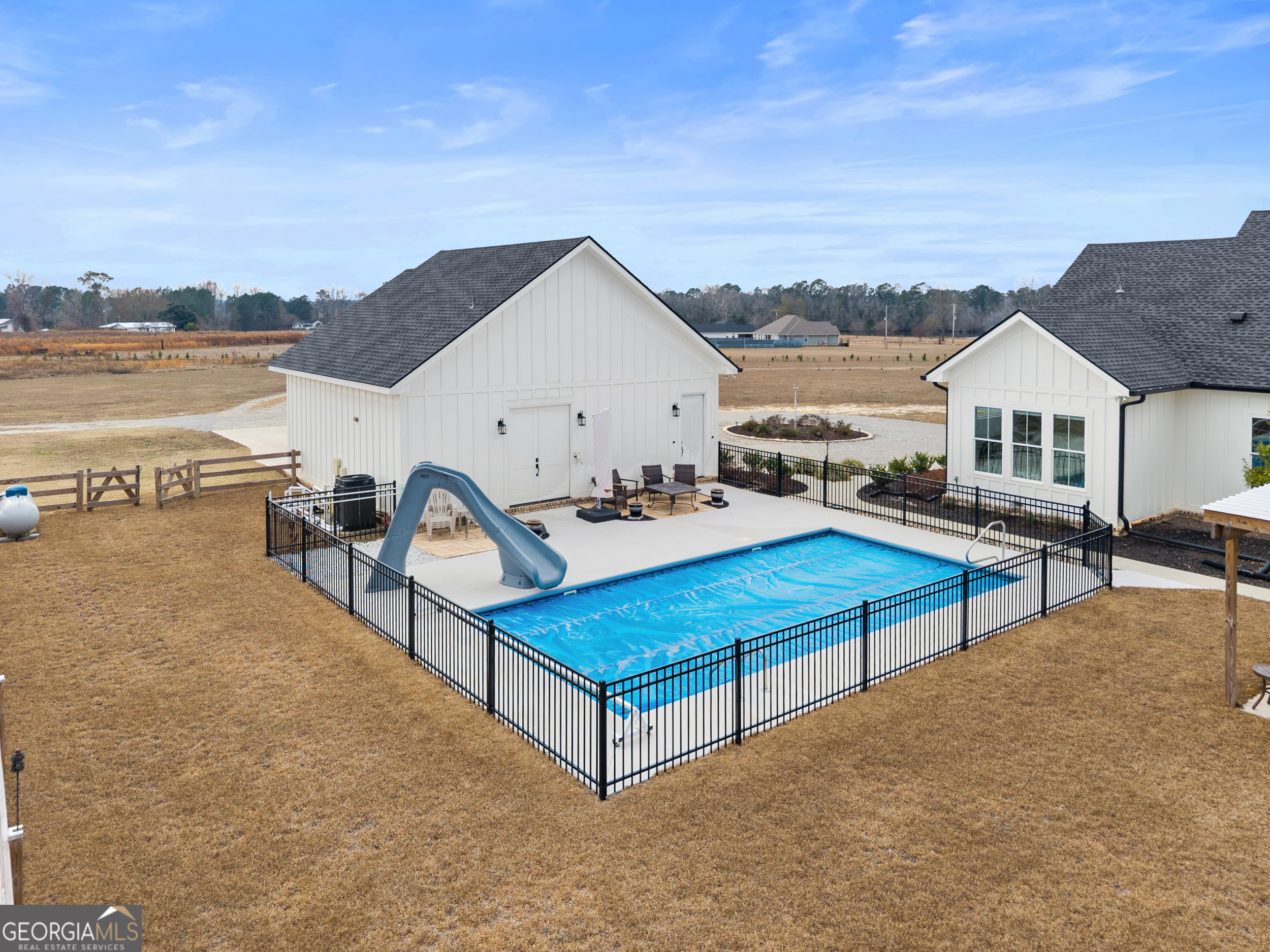 430 Jack Kennedy Road Statesboro, GA 30458 - Photo 33 of 44 a view of a terrace with sitting area