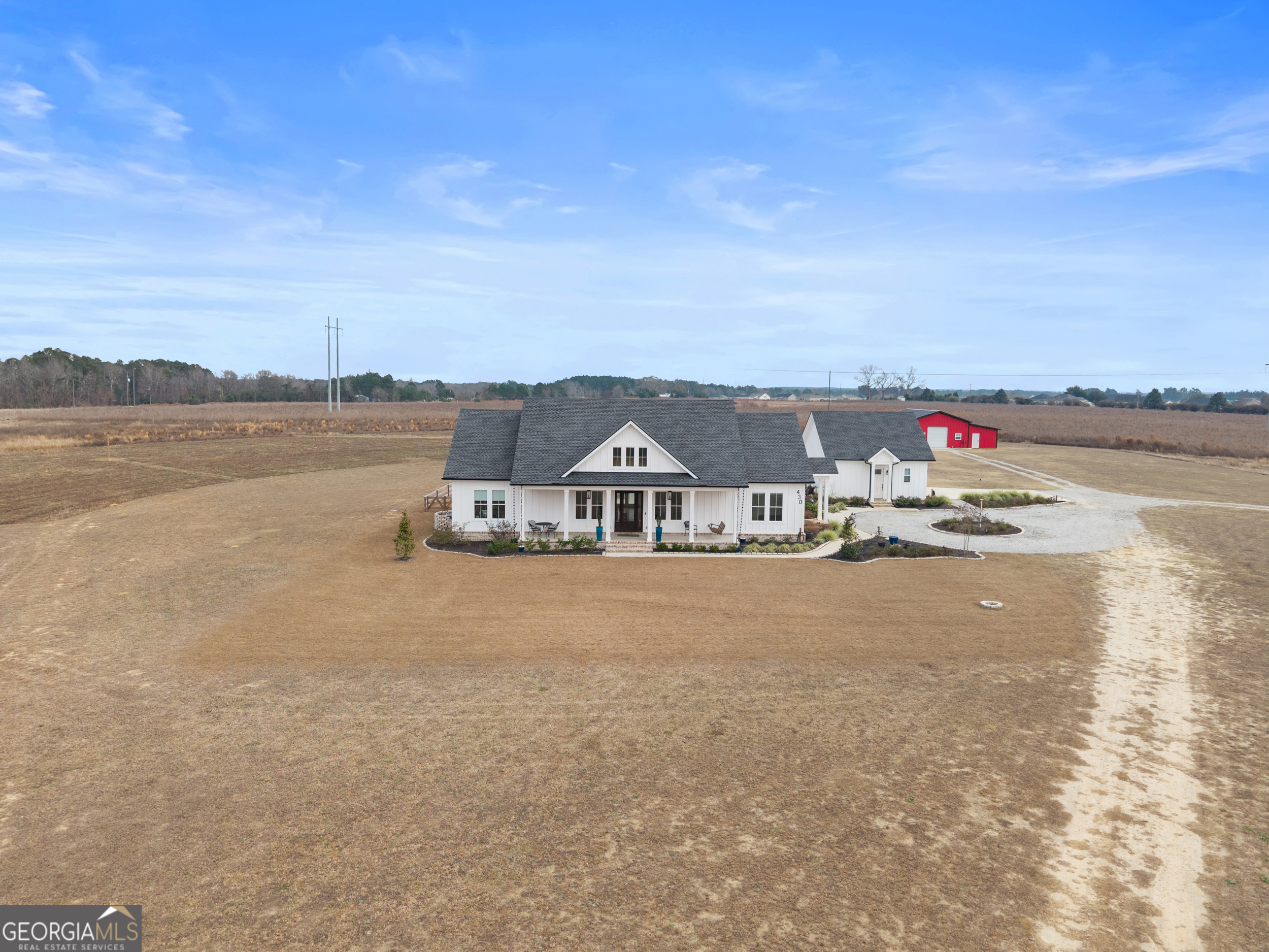 430 Jack Kennedy Road Statesboro, GA 30458 - Photo 36 of 44 a view of a lake with a city