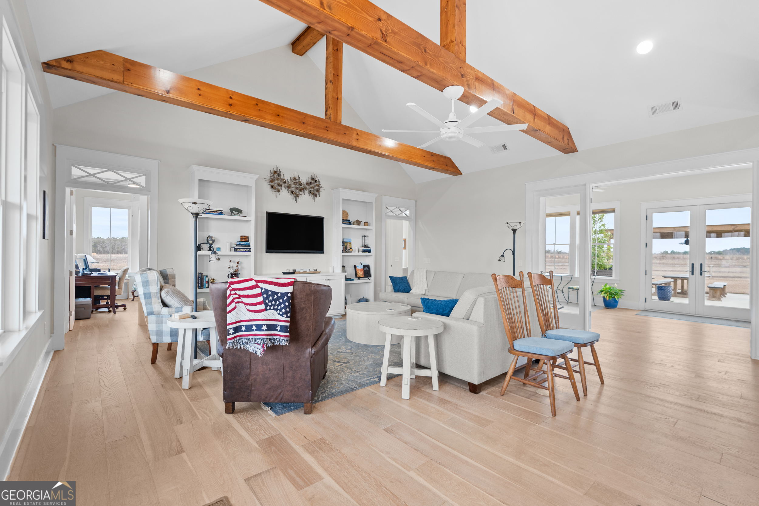 430 Jack Kennedy Road Statesboro, GA 30458 - Photo 6 of 44 a living room with furniture and a flat screen tv
