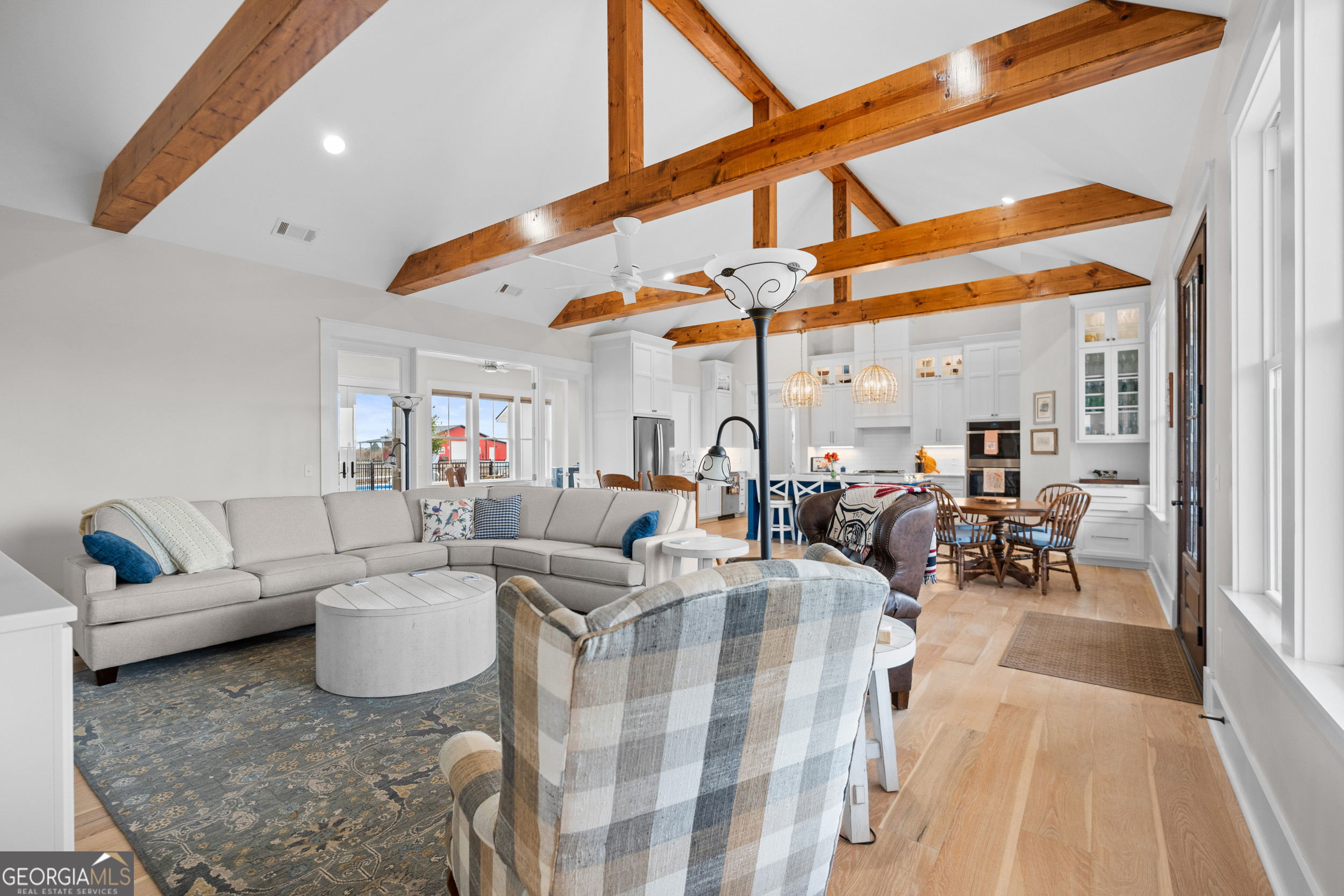 430 Jack Kennedy Road Statesboro, GA 30458 - Photo 8 of 44 a living room with furniture and a large window