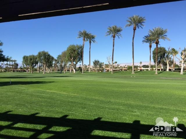 8 Duke Drive Rancho Mirage, CA 92270 - Photo 13 of 15 a view of a golf course with a big yard