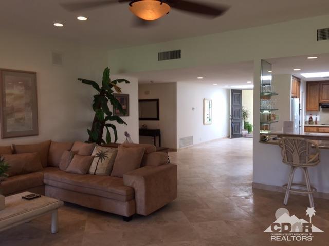 8 Duke Drive Rancho Mirage, CA 92270 - Photo 3 of 15 a living room with furniture and a wooden floor