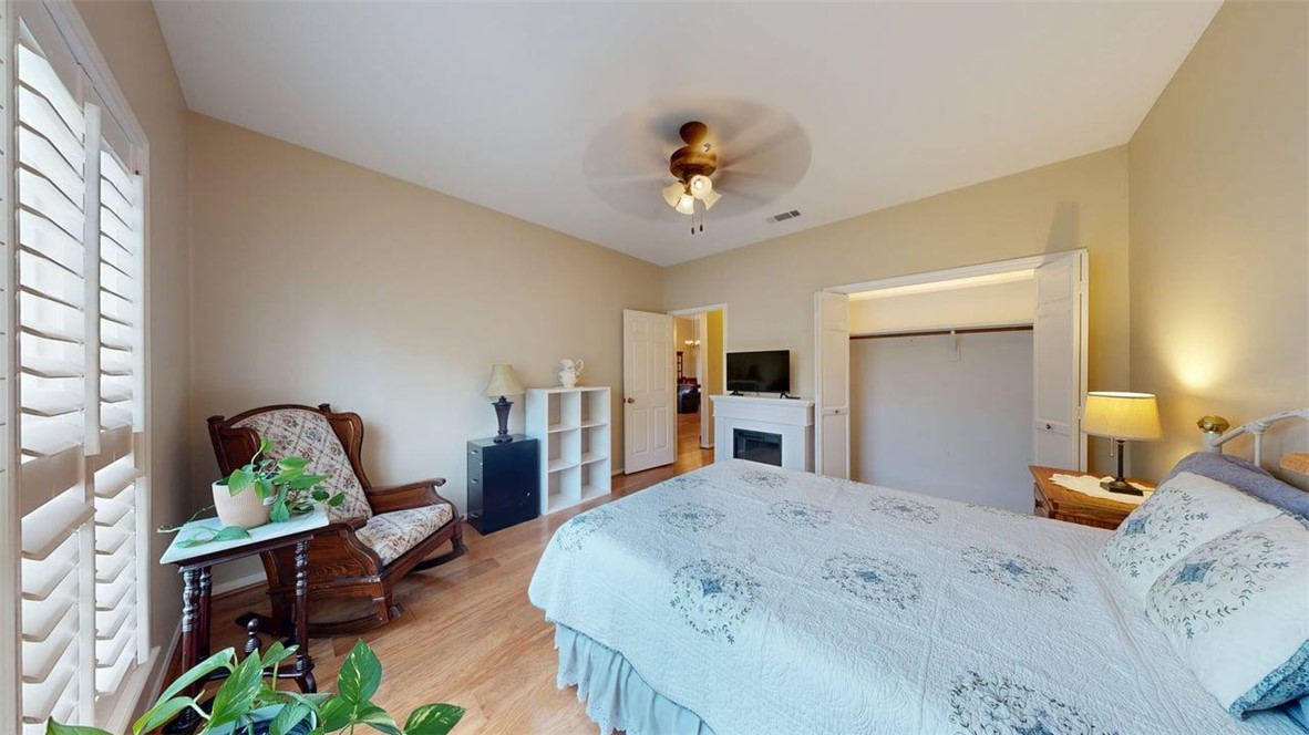705 Walker Street Bryan, TX 77802 - Photo 17 of 46 a view of a bedroom with furniture and windows