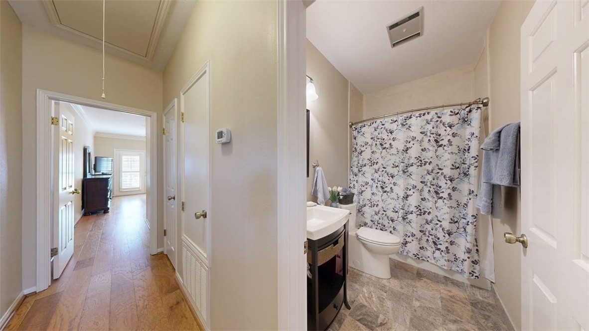705 Walker Street Bryan, TX 77802 - Photo 19 of 46 a bathroom with a sink and a shower