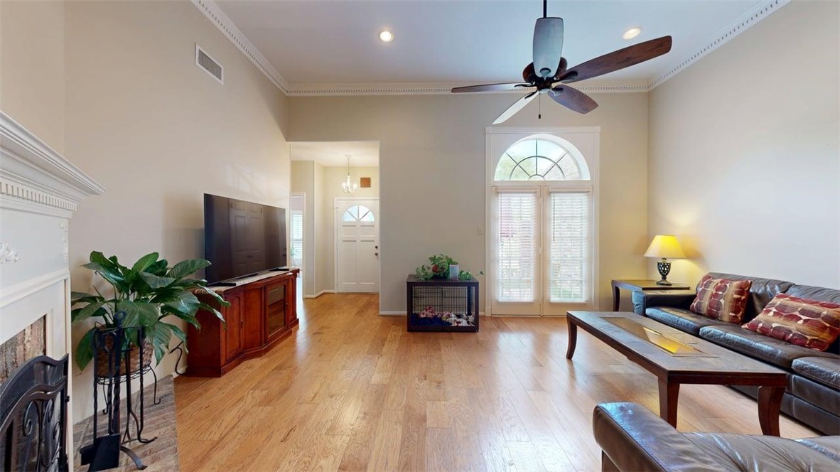 705 Walker Street Bryan, TX 77802 - Photo 3 of 46 a living room with furniture and a flat screen tv