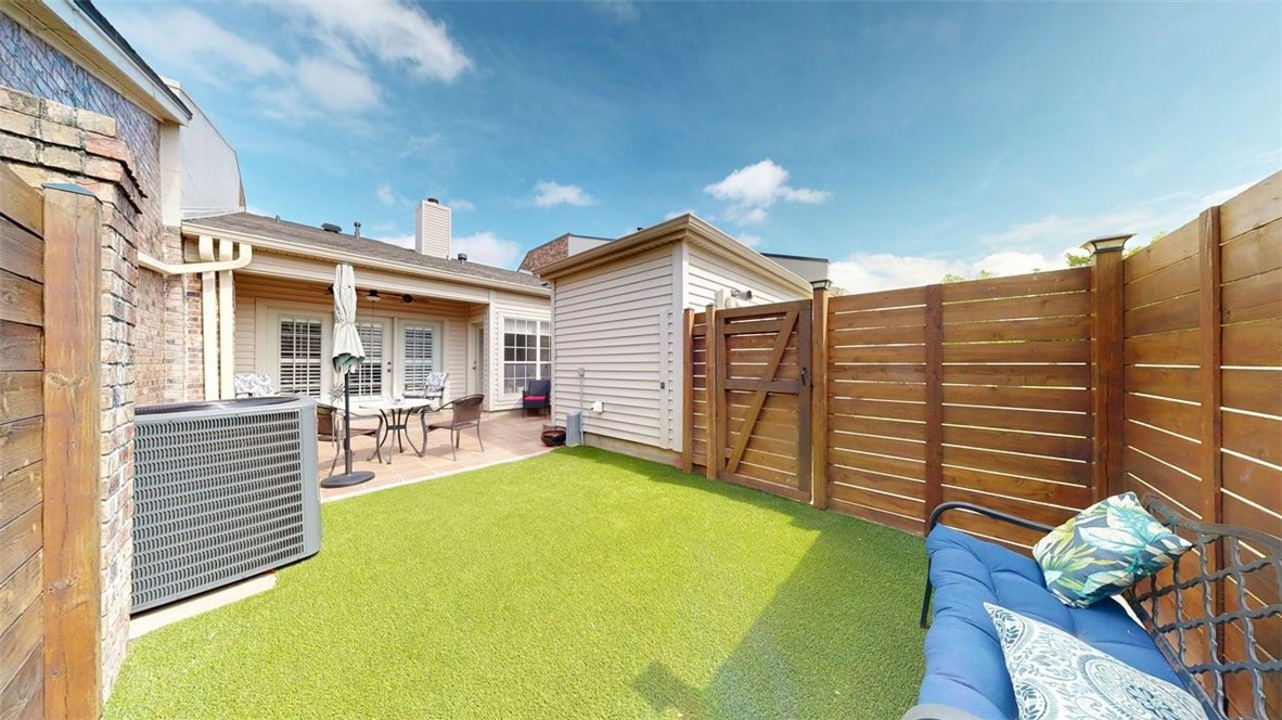 705 Walker Street Bryan, TX 77802 - Photo 41 of 46 a view of a patio with table and chairs and a barbeque