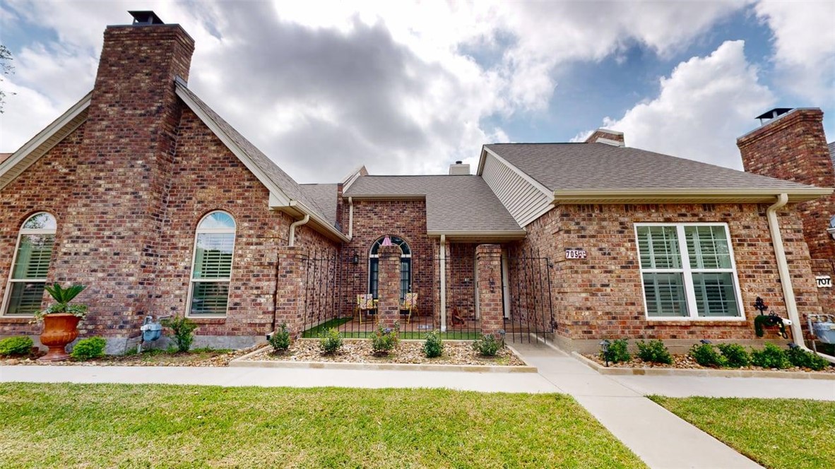 705 Walker Street Bryan, TX 77802 - Photo 45 of 46 front view of a house with a yard