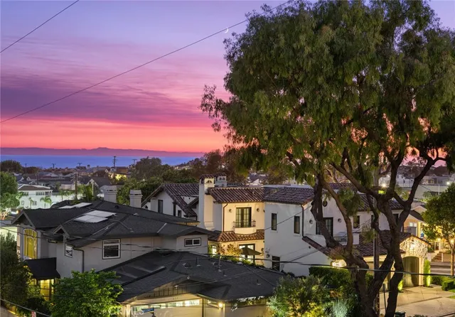 a living room with fireplace furniture and a flat screen tv