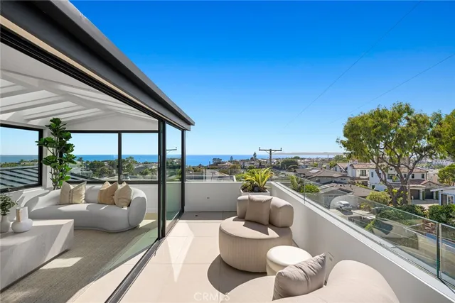 a large kitchen with a table and chairs