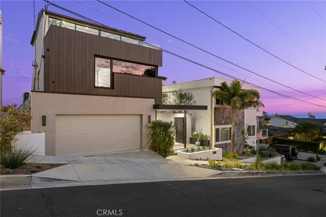front view of a house with a street