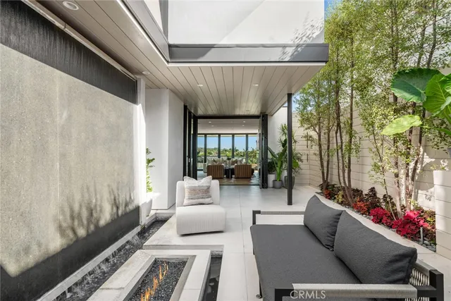 a bedroom with a large bed and a balcony view