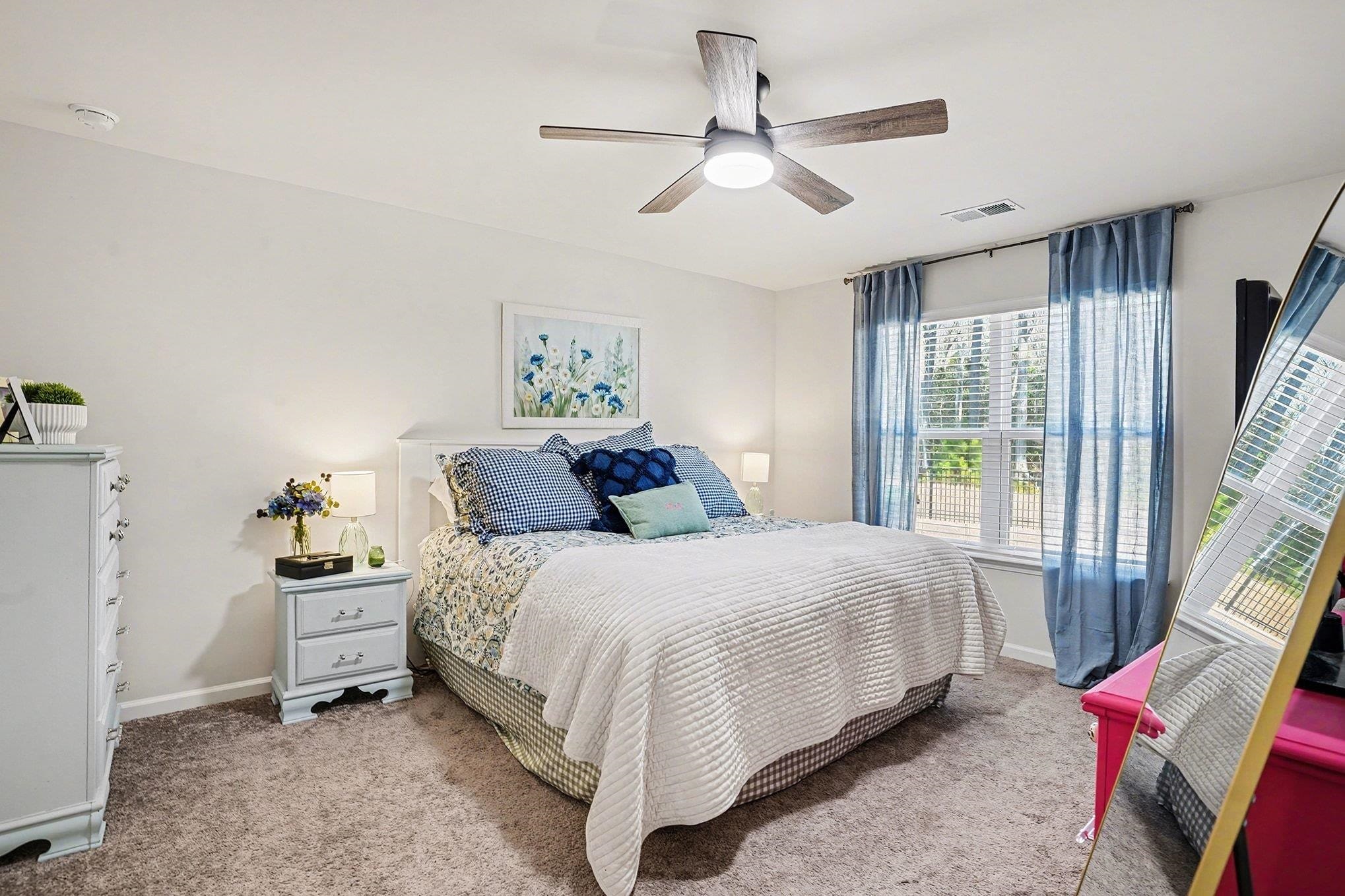 172 Seasons Trace Loop Longs, SC 29568 - Photo 19 of 37 Carpeted bedroom featuring baseboards and a ceiling fan