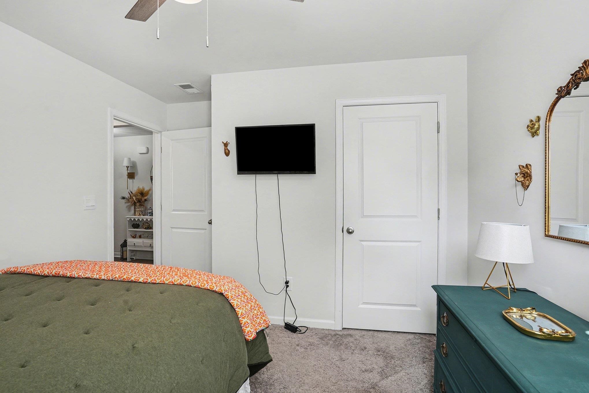 172 Seasons Trace Loop Longs, SC 29568 - Photo 21 of 37 Bedroom with light colored carpet and ceiling fan