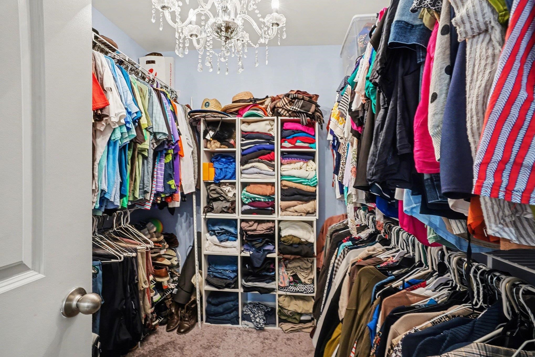172 Seasons Trace Loop Longs, SC 29568 - Photo 24 of 37 Spacious closet with a chandelier and carpet