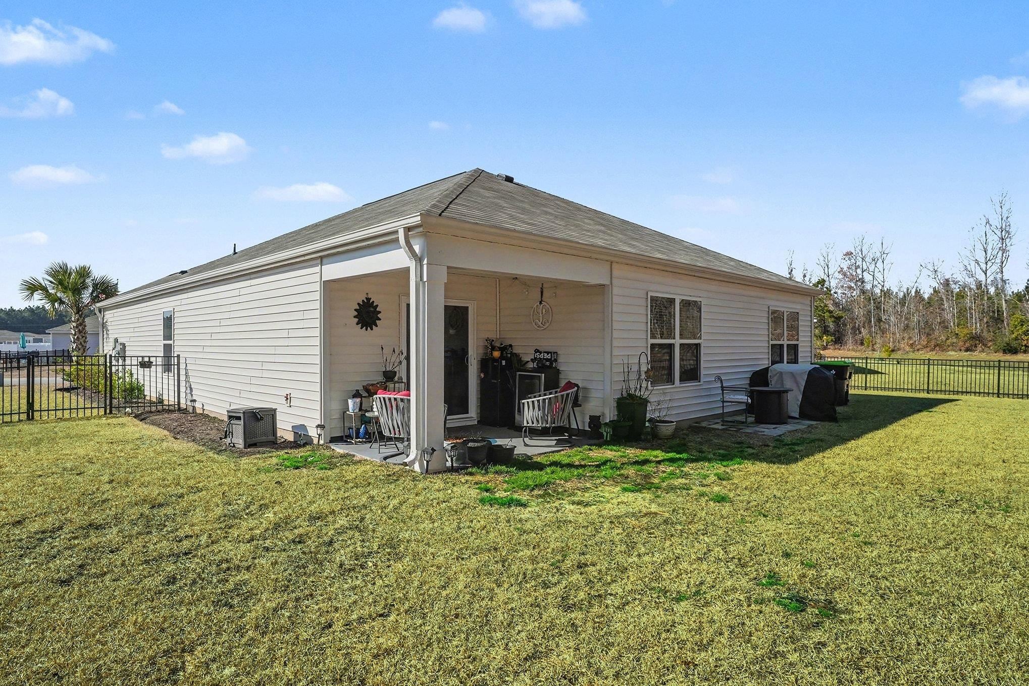 172 Seasons Trace Loop Longs, SC 29568 - Photo 29 of 37 Back of property featuring a patio