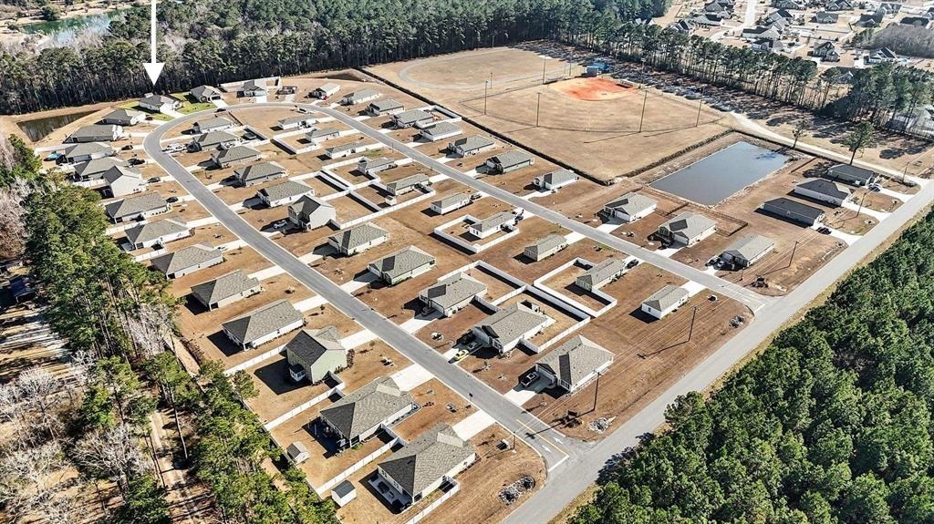 172 Seasons Trace Loop Longs, SC 29568 - Photo 34 of 37 Aerial view of property's location with nearby suburban area