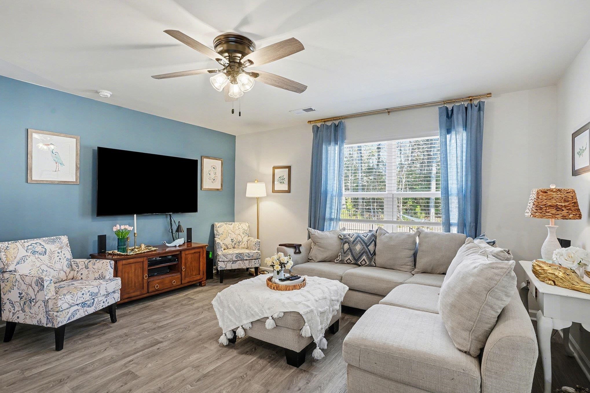 172 Seasons Trace Loop Longs, SC 29568 - Photo 7 of 37 Living room featuring wood finished floors and ceiling fan