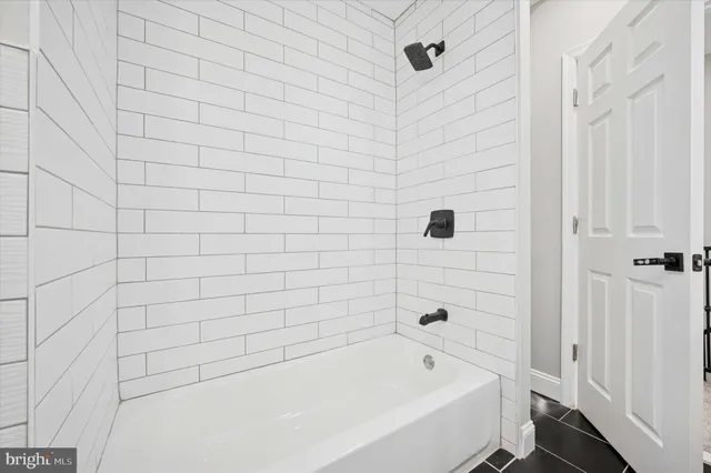 a bathroom with a bathtub