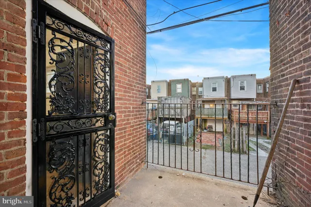 a view of a brick wall of the building