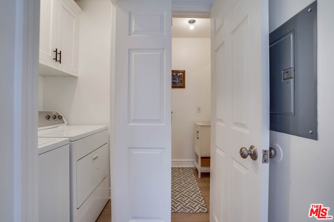 2049 Rome Drive Los Angeles, CA 90065 - Photo 18 of 43 a bathroom with a sink and mirror