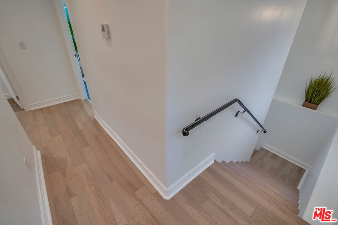 2049 Rome Drive Los Angeles, CA 90065 - Photo 19 of 43 a view of staircase with white walls