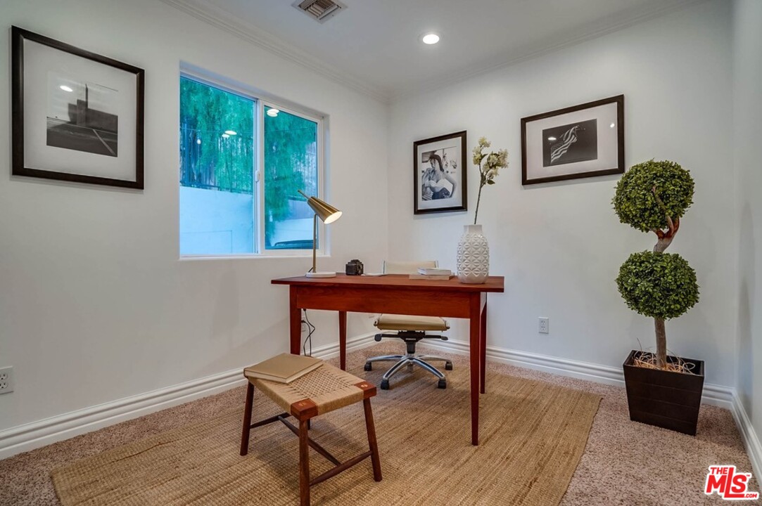 2049 Rome Drive Los Angeles, CA 90065 - Photo 27 of 43 a view of a workspace with furniture and wooden floor