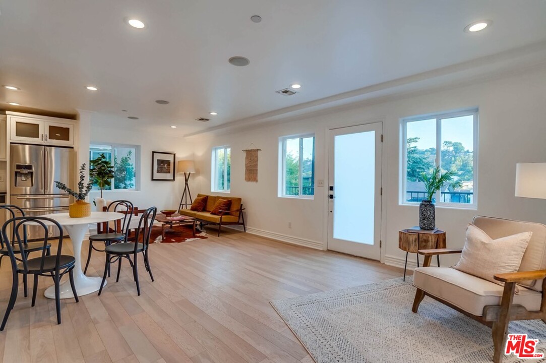 2049 Rome Drive Los Angeles, CA 90065 - Photo 4 of 43 a living room with furniture and a wooden floor